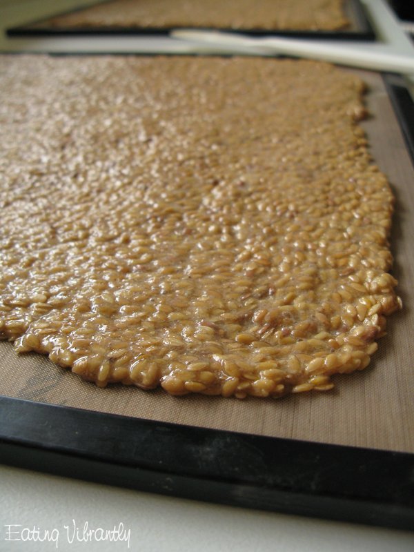 Flax cracker mix spread thinly on dehydrator tray