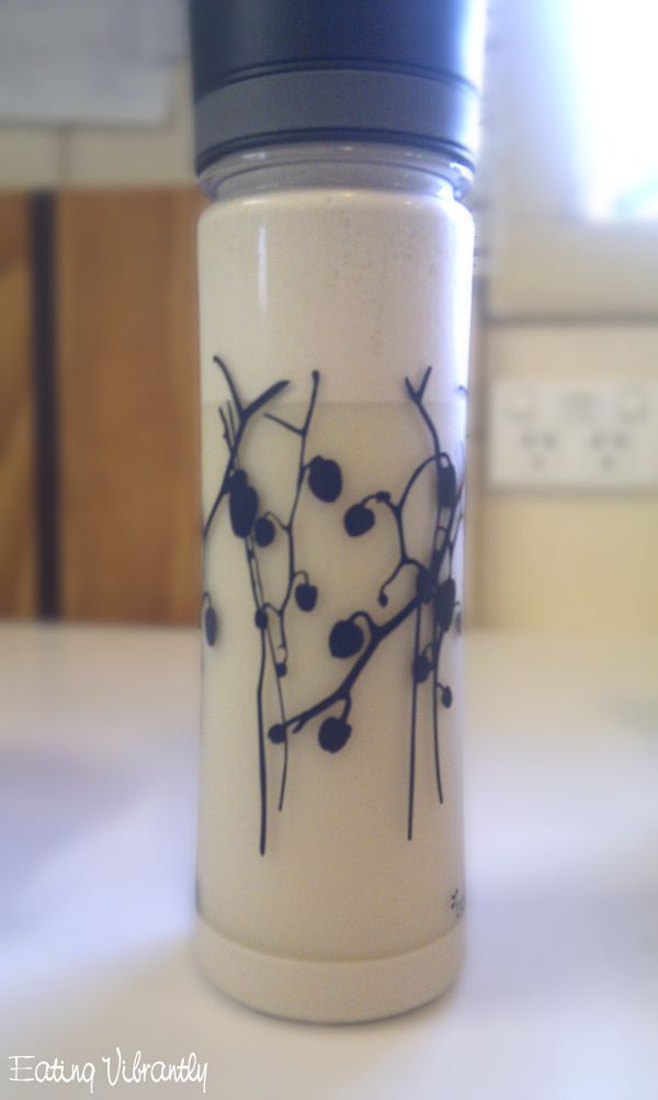 Raw vegan almond milk in bottle